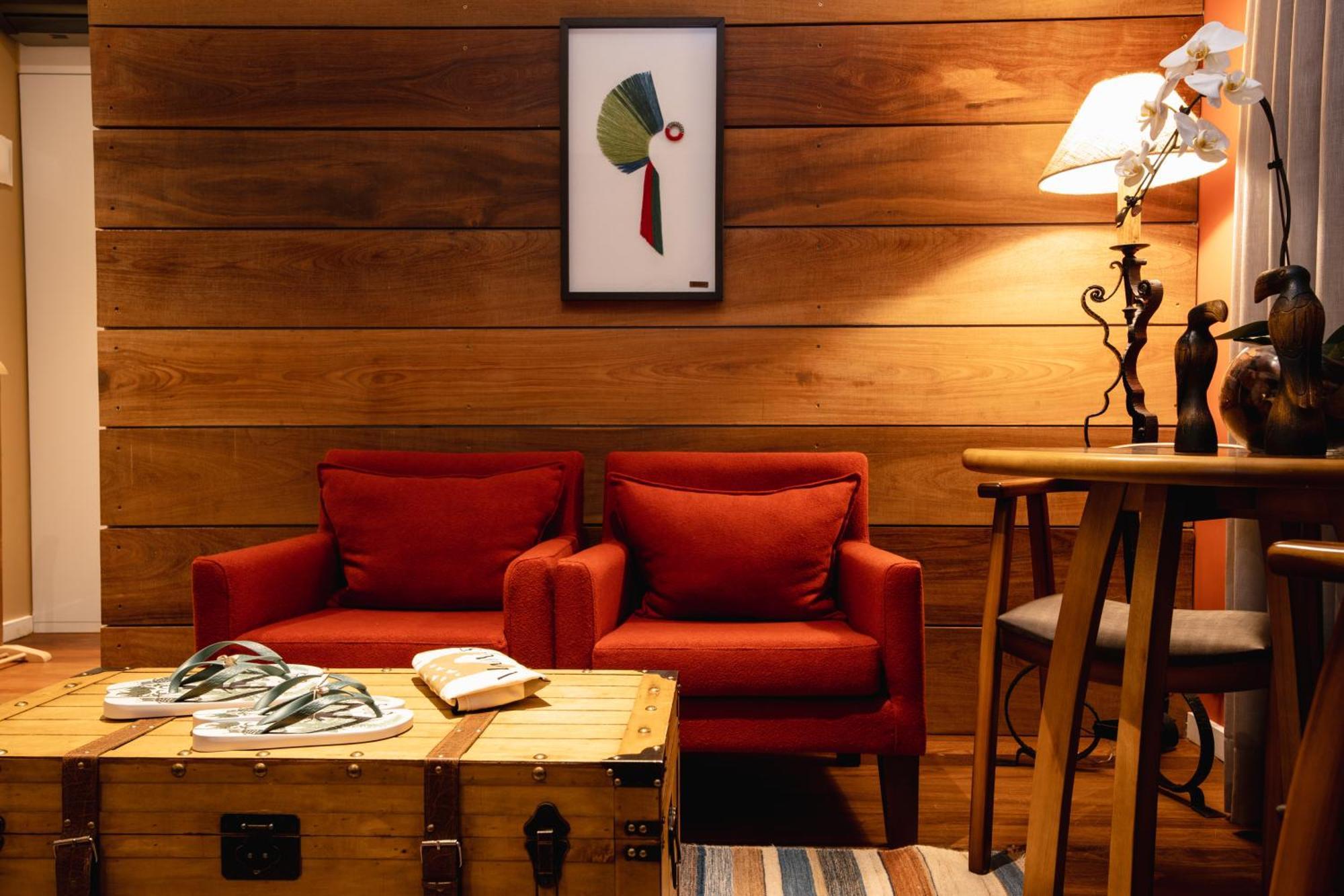 Sanma Hotel Foz do Iguacu Exterior photo A living room with a wooden wall