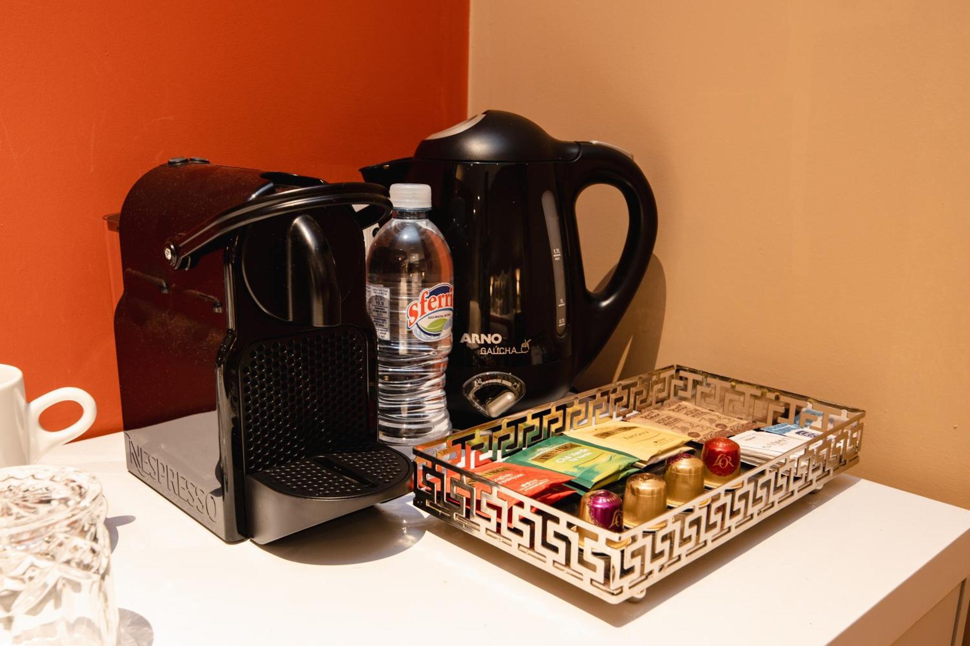 Sanma Hotel Foz do Iguacu Exterior photo A Nespresso coffee machine in a hotel room